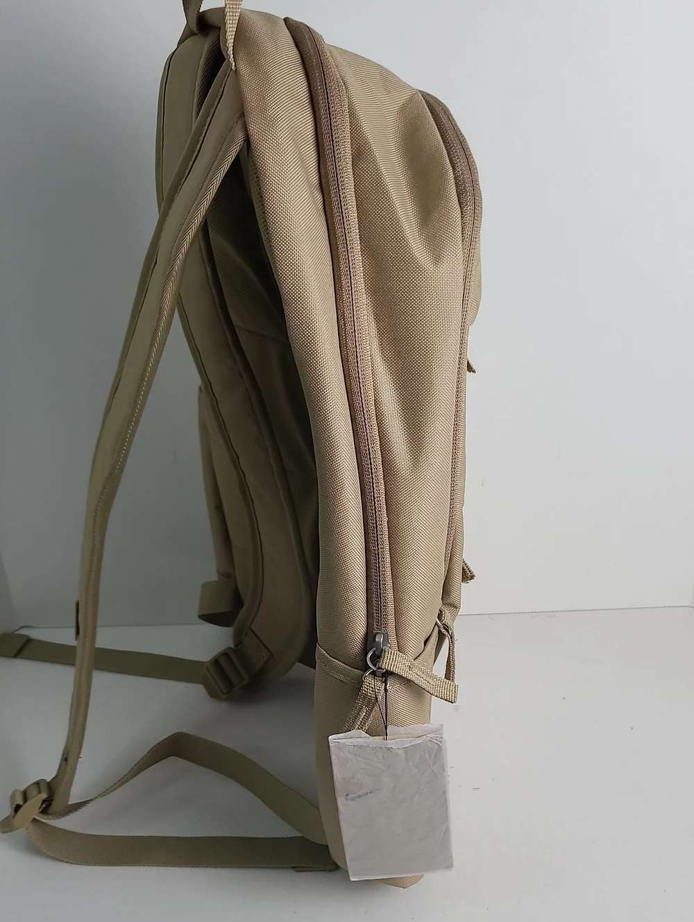 NWT NIKE Mulriple Zip Compartment Pockets Backpack Tan Beige with White Logo